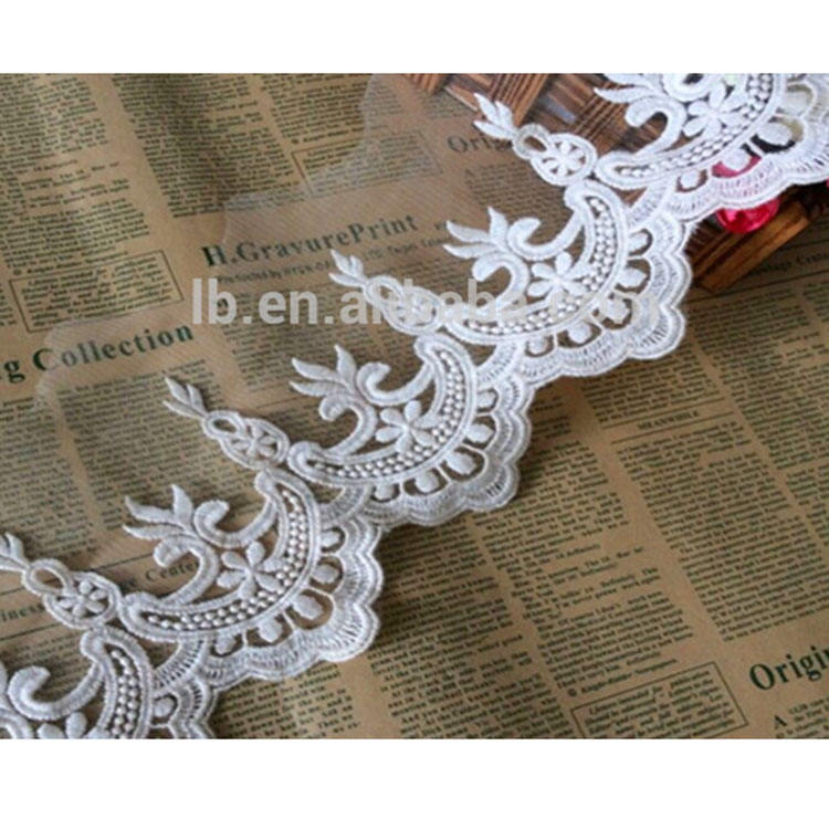 Bellissimo design all'uncinetto in pizzo a maglia per abiti da sposa