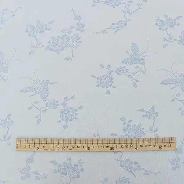 Tessuto jacquard radiale colorato in rilievo testurato per abiti
